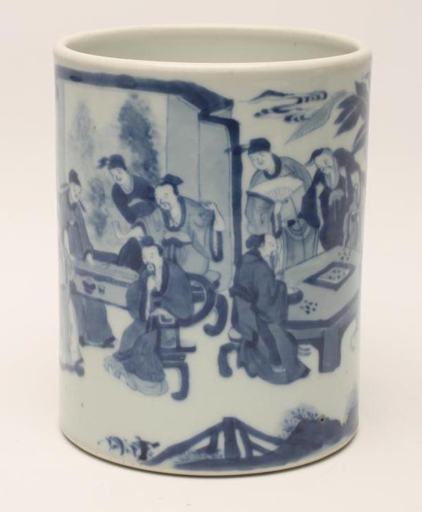 A CHINESE PORCELAIN BRUSH POT of plain cylindrical form painted in underglaze blue with a continuous Image