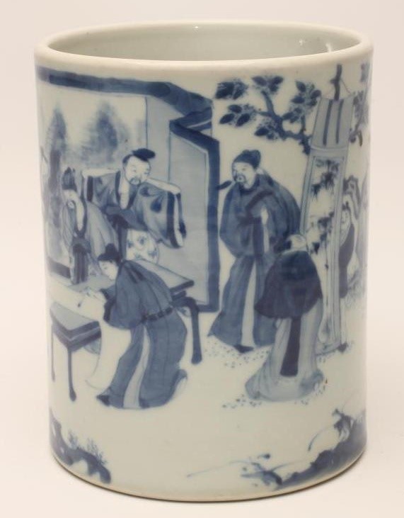 A CHINESE PORCELAIN BRUSH POT of plain cylindrical form painted in underglaze blue with a continuous Image