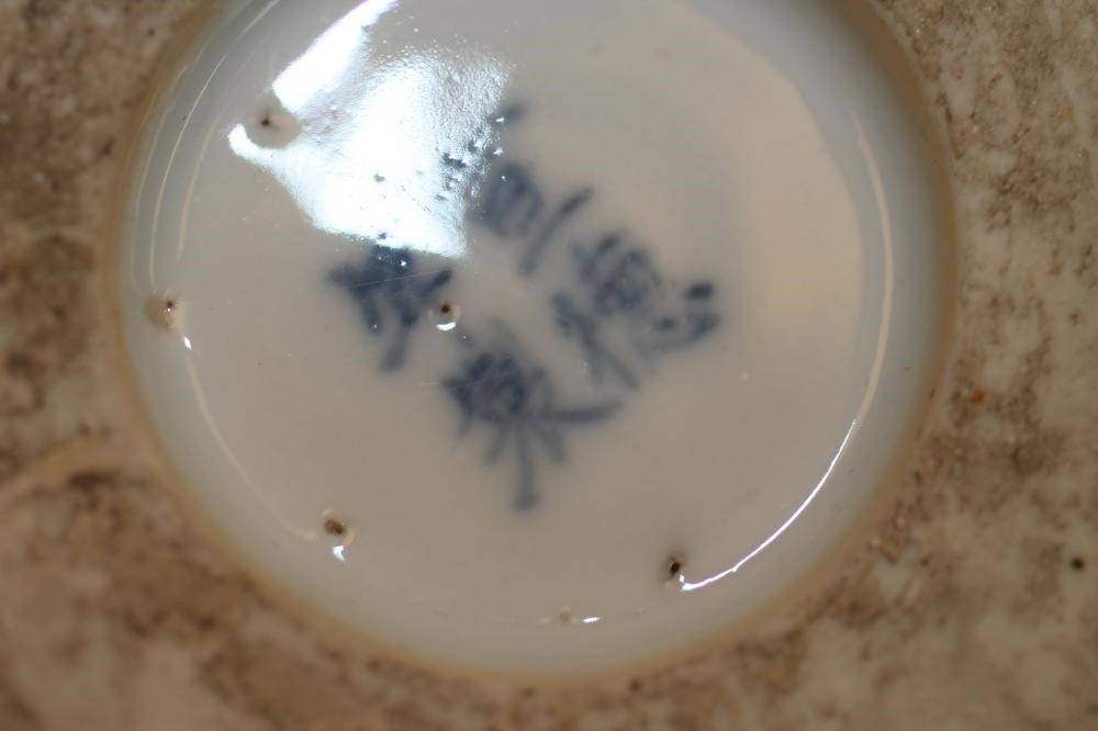 A CHINESE PORCELAIN BRUSH POT of plain cylindrical form painted in underglaze blue with a continuous Image