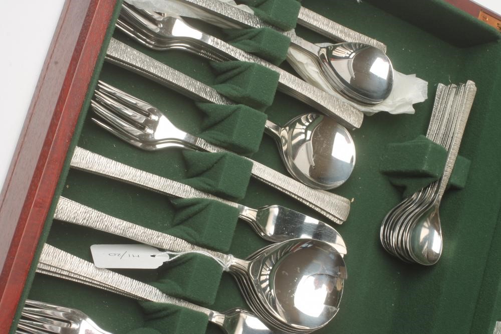 A VINERS STUDIO "SANT ANDREA" STAINLESS STEEL TABLE SERVICE with brushed bark effect handles Image