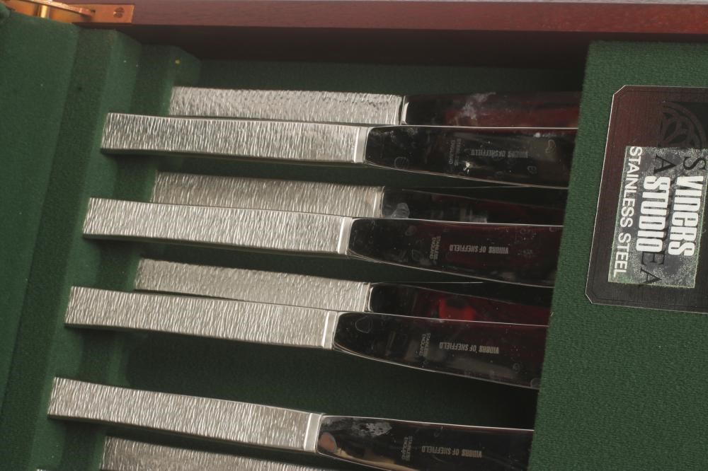 A VINERS STUDIO "SANT ANDREA" STAINLESS STEEL TABLE SERVICE with brushed bark effect handles Image