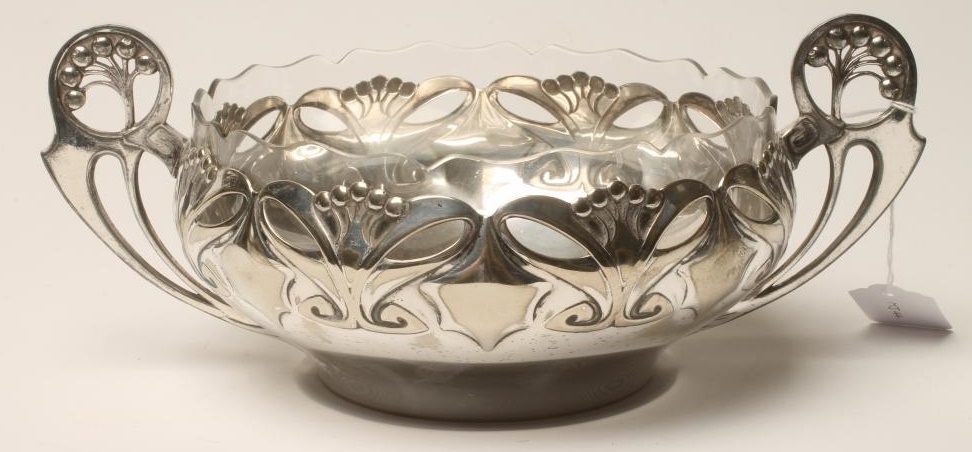 AN ART NOUVEAU WMF BOWL of bombe circular form with two stylised berried loop handles Image