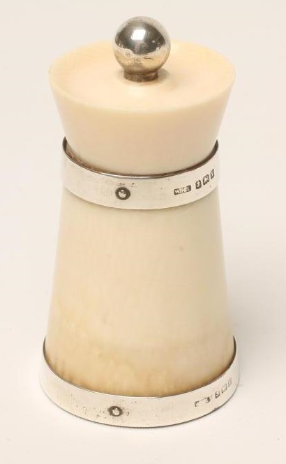 AN ART DECO SILVER MOUNTED IVORY PEPPER GRINDER Image