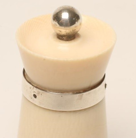 AN ART DECO SILVER MOUNTED IVORY PEPPER GRINDER Image