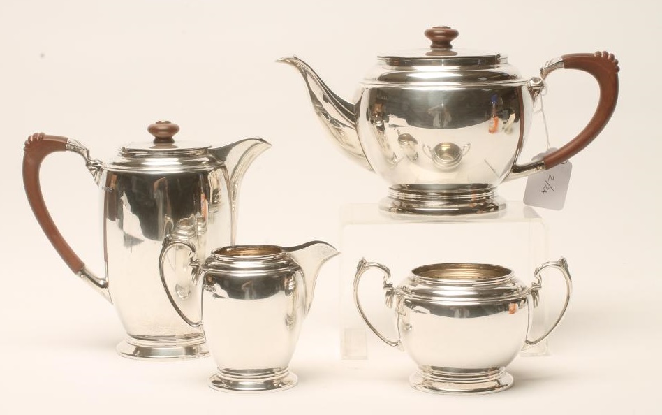 *A THREE PIECE SILVER TEA SERVICE Image
