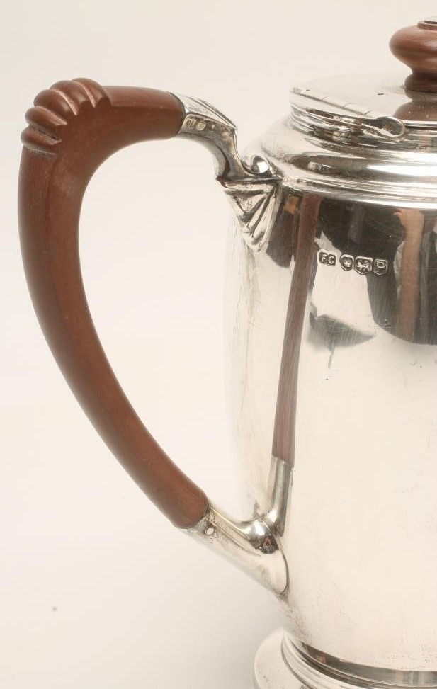 *A THREE PIECE SILVER TEA SERVICE Image