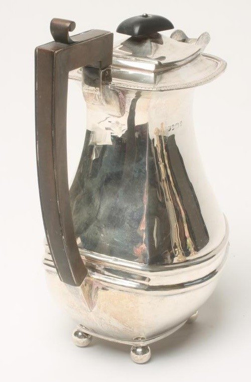 *A SILVER COFFEE POT Image