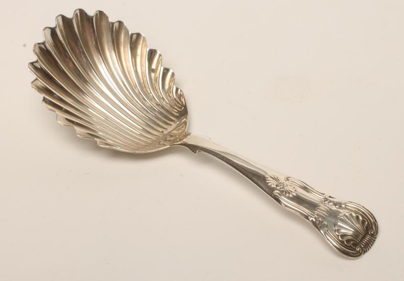 A GEORGE IV SILVER CADDY SPOON Image