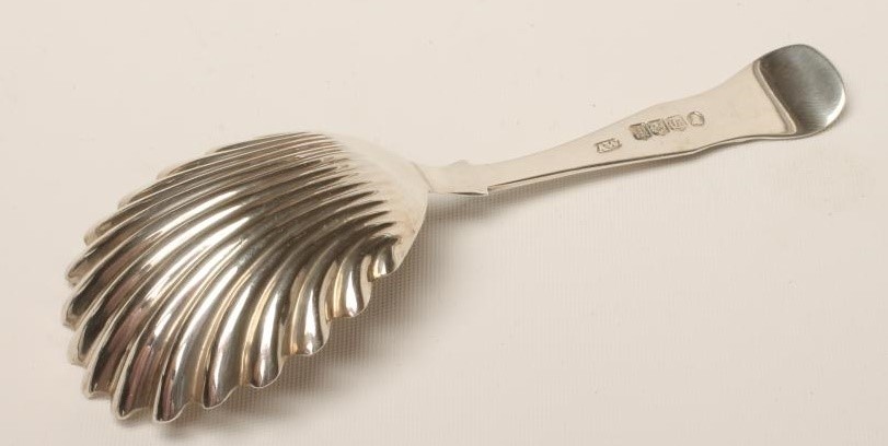 A GEORGE IV SILVER CADDY SPOON Image