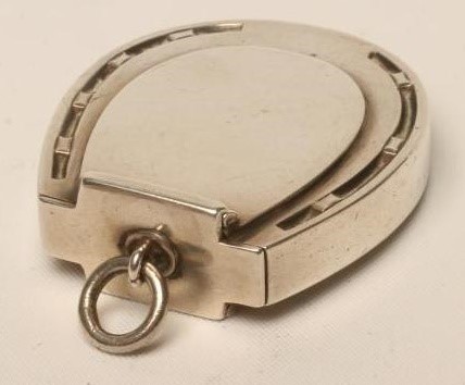 A LATE VICTORIAN SILVER NOVELTY VESTA Image