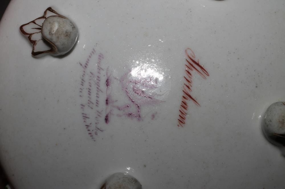 A ROCKINGHAM PORCELAIN SMALL BASKET Image