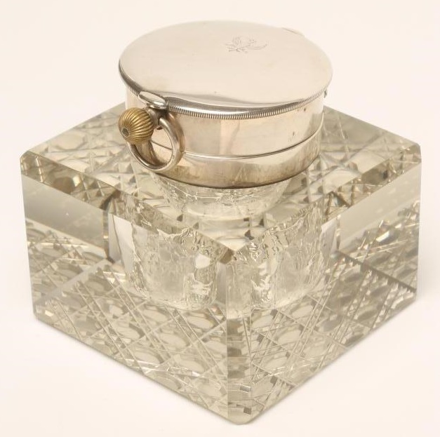 AN EDWARDIAN HEAVY GLASS SILVER MOUNTED INKWELL Image
