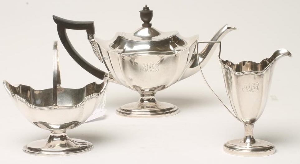 AN EDWARDIAN SILVER THREE PIECE TEA SERVICE Image