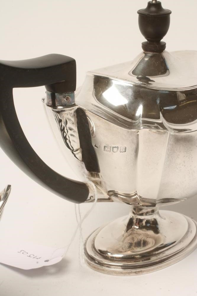 AN EDWARDIAN SILVER THREE PIECE TEA SERVICE Image