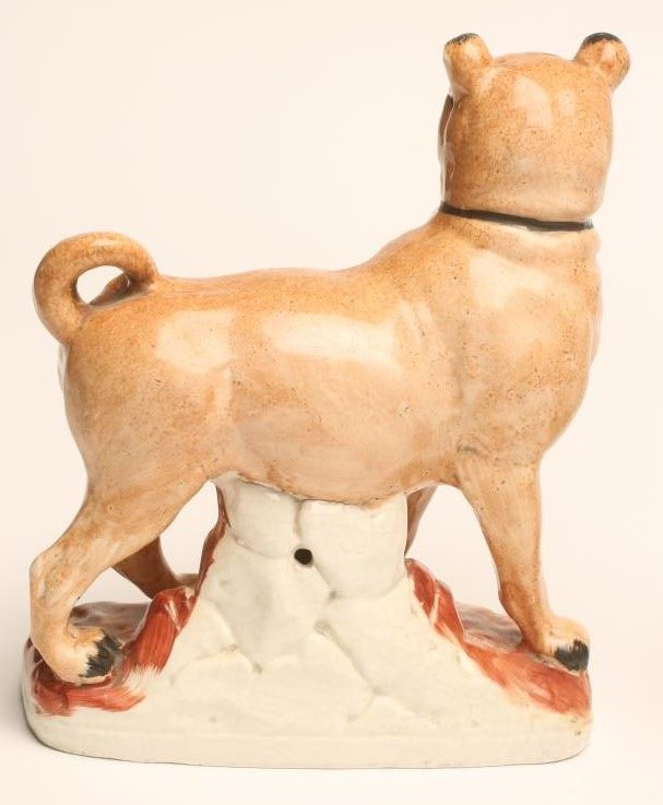 A PAIR OF LATE VICTORIAN STAFFORDSHIRE POTTERY PUGS Image