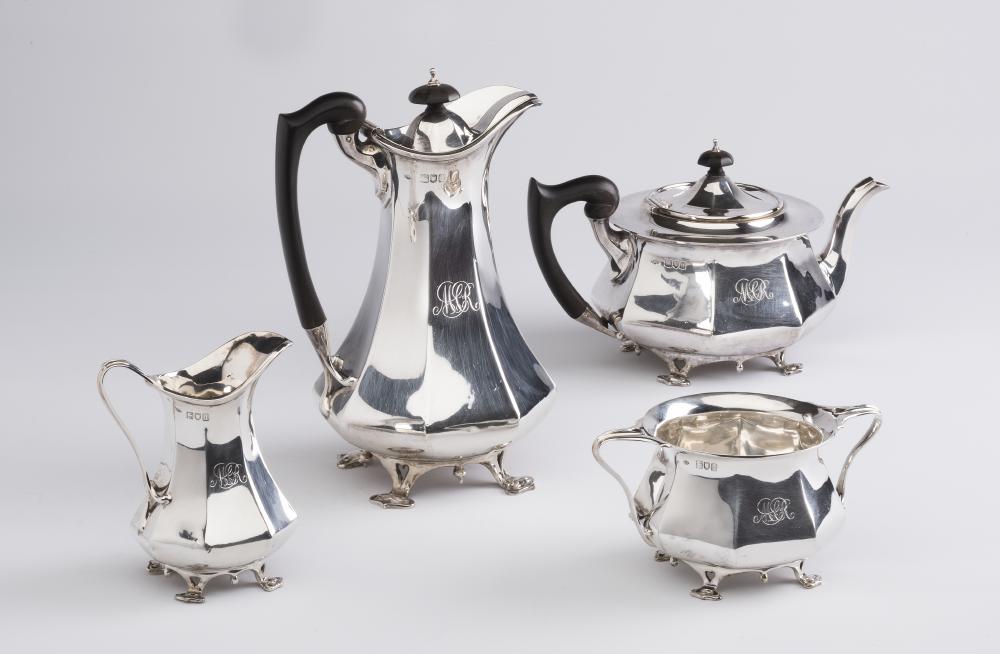 AN EDWARDIAN ARTS AND CRAFTS SILVER FOUR PIECE TEA SERVICE Image