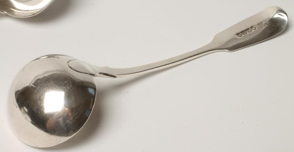 A PAIR OF VICTORIAN SILVER SAUCE LADLES Image