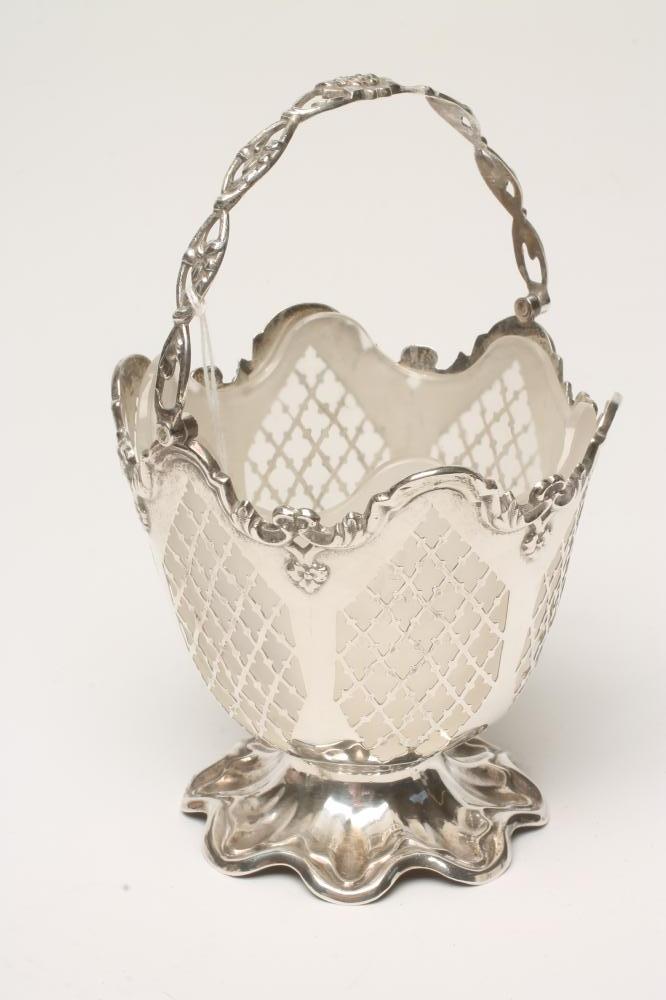 A VICTORIAN SILVER SUGAR BASKET Image