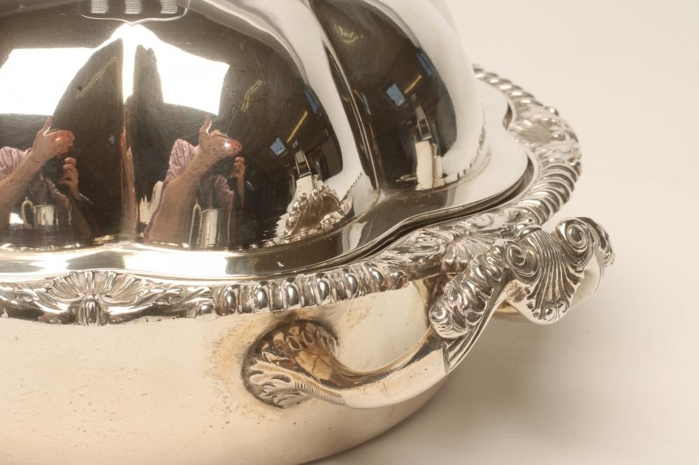 A LATE GEORGE III SILVER MUFFIN DISH AND COVER Image