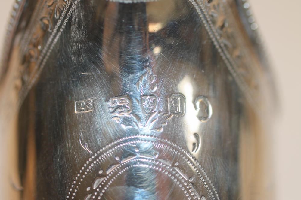 A GEORGE III SILVER PEDESTAL HELMET JUG Image