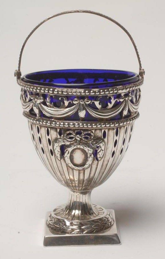 A GEORGE III SILVER SUGAR BASKET Image