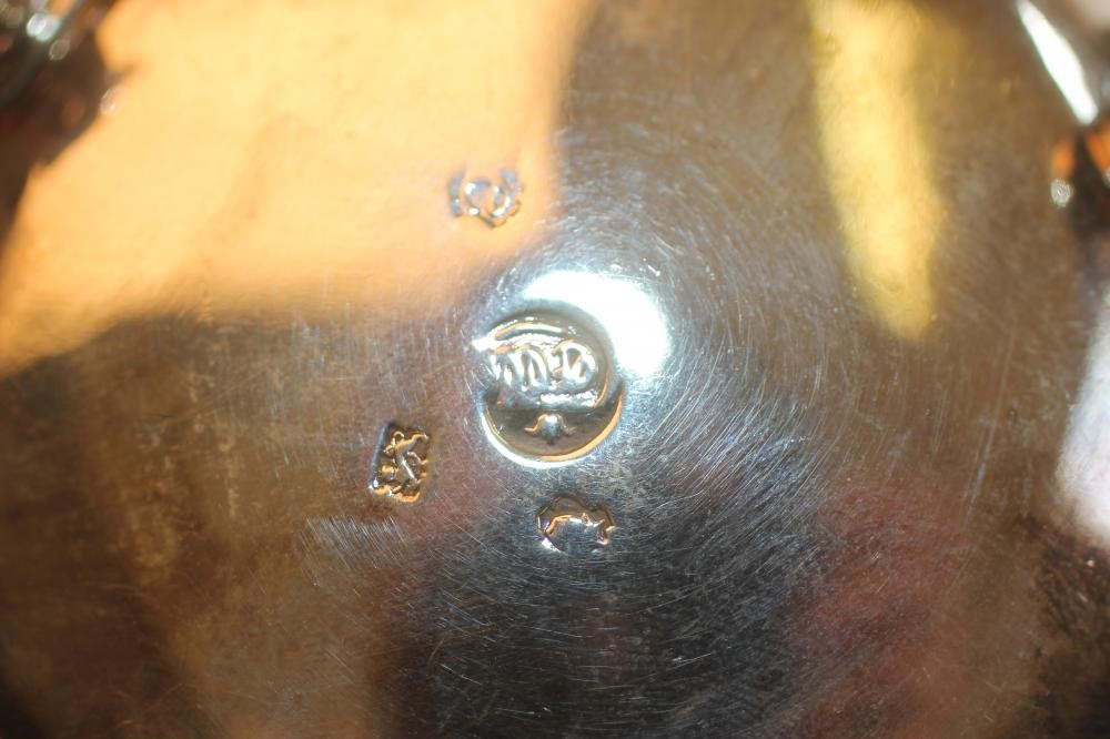 A PAIR OF GEORGE II SILVER CAULDRON SALTS Image