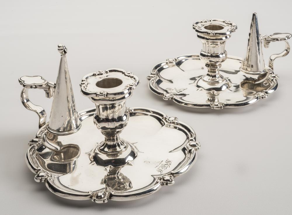 A PAIR OF GEORGE IV SILVER CHAMBERSTICKS Image