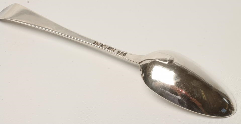 A LATE GEORGE III SILVER TABLESPOON Image