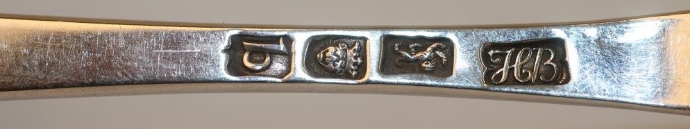 A LATE GEORGE III SILVER TABLESPOON Image