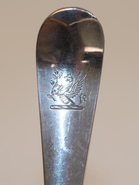A LATE GEORGE III SILVER TABLESPOON Image