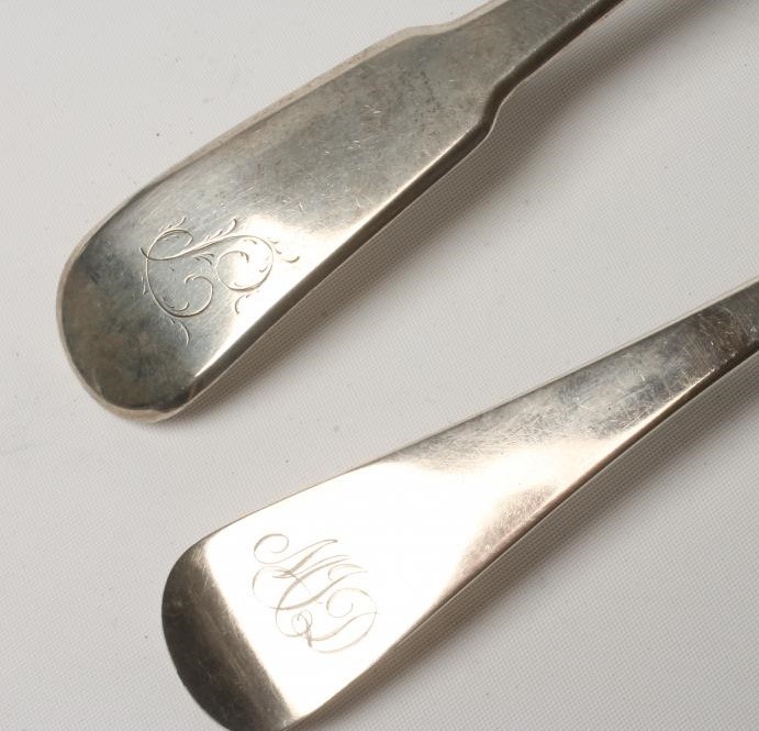 A LATE GEORGE III SILVER BASTING SPOON Image