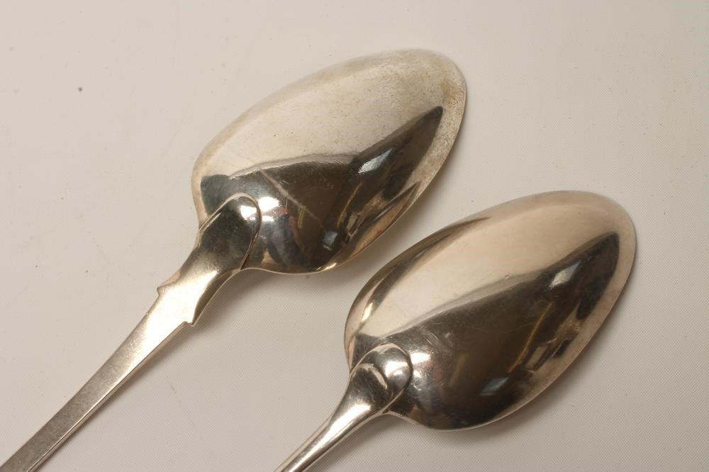 A LATE GEORGE III SILVER BASTING SPOON Image