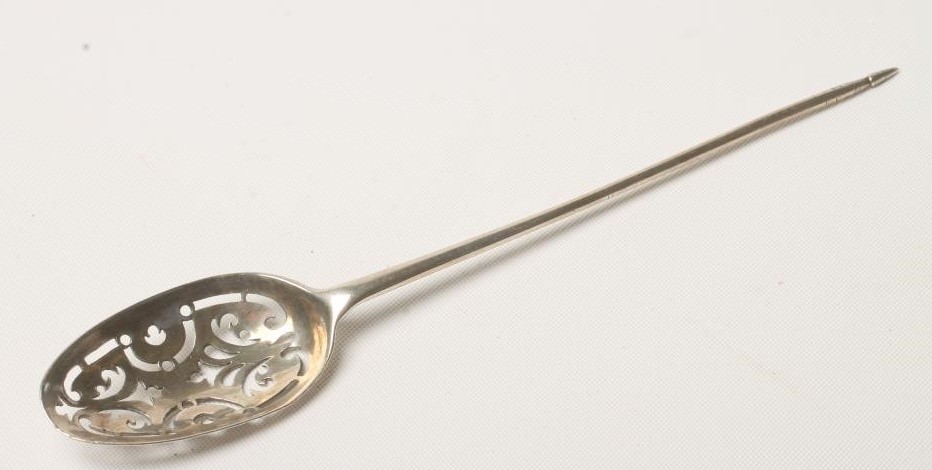 A GEORGE II SILVER MOTE SPOON Image