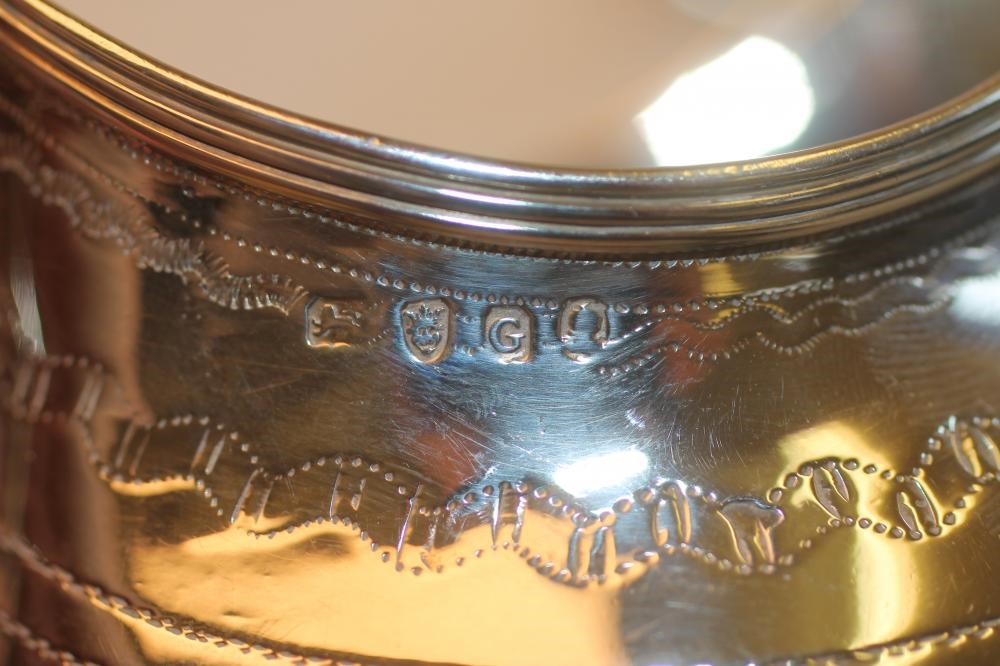 A GEORGE III SILVER MILK JUG Image