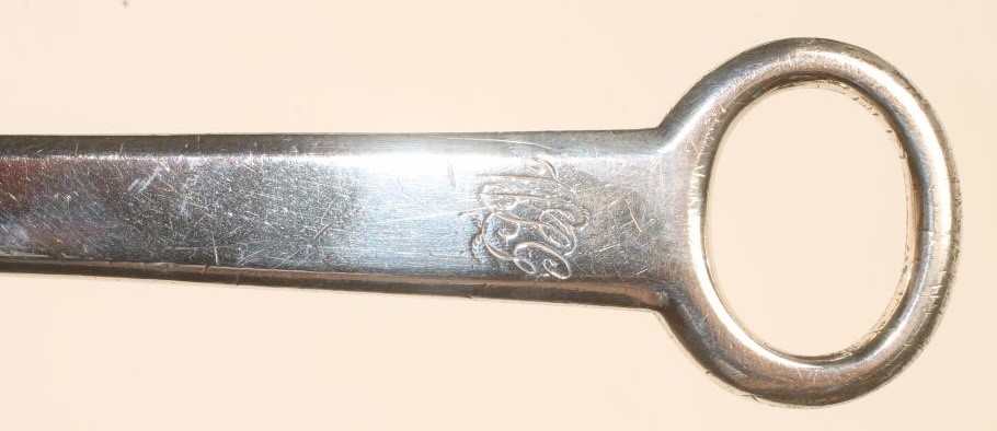 A LATE GEORGE III SILVER MEAT SKEWER Image