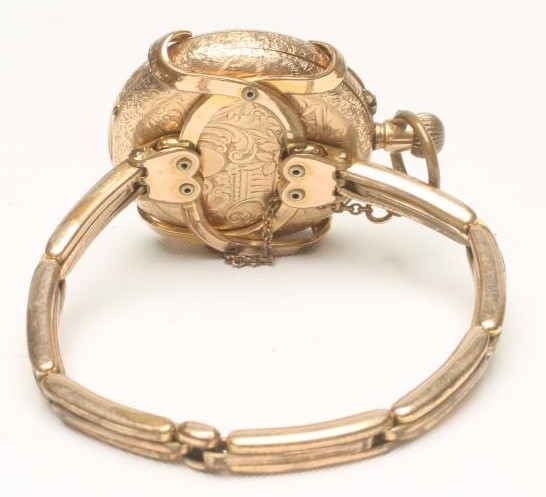 A LADY'S 14K GOLD TOP WIND FOB WATCH Image