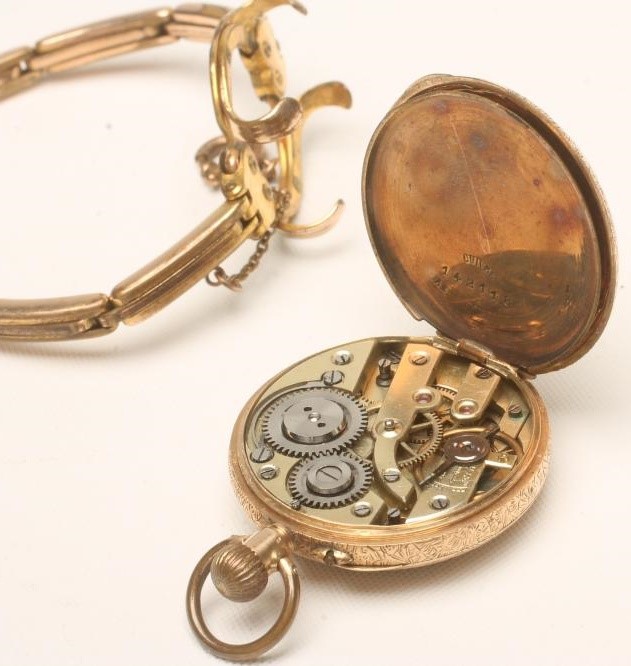 A LADY'S 14K GOLD TOP WIND FOB WATCH Image