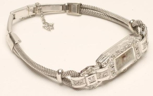 AN ART DECO DIAMOND SET COCKTAIL WATCH Image