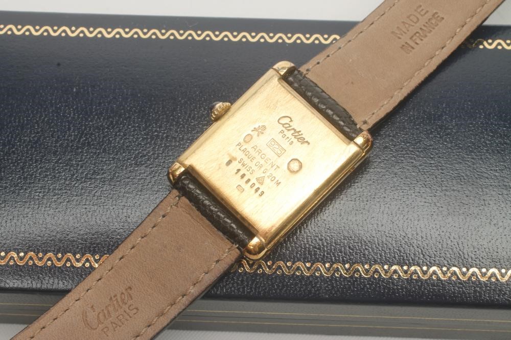 A MUST DE CARTIER SILVER GILT "TANK" WATCH Image