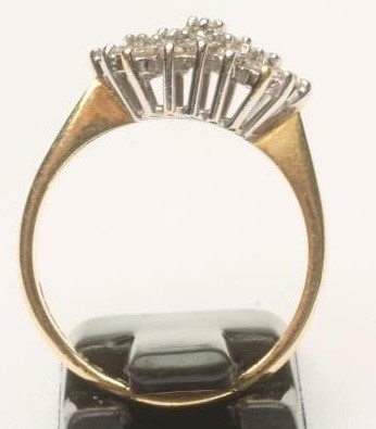 A DIAMOND CLUSTER RING Image