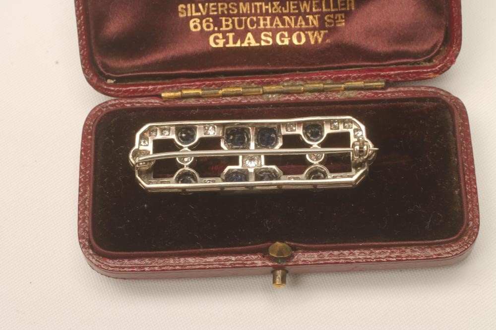 AN ART DECO SAPPHIRE AND DIAMOND BROOCH Image