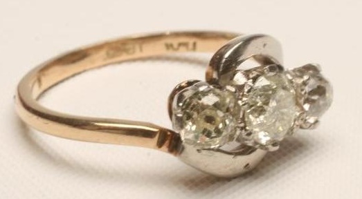 A THREE STONE DIAMOND RING Image