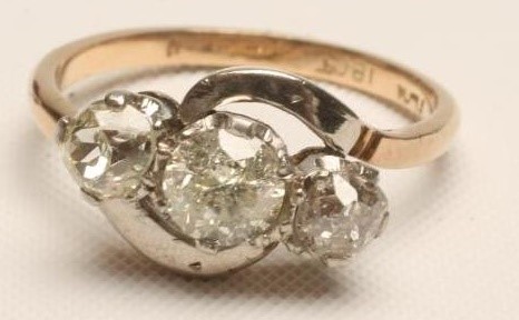 A THREE STONE DIAMOND RING Image