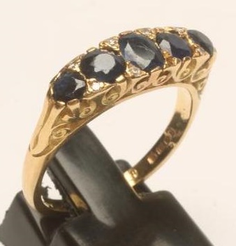 A FIVE STONE SAPPHIRE RING Image