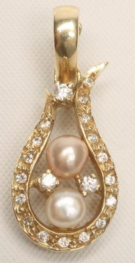 A PEARL AND DIAMOND PENDANT Image