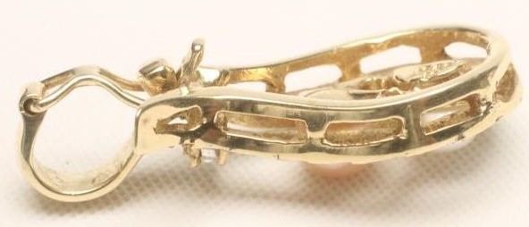 A PEARL AND DIAMOND PENDANT Image