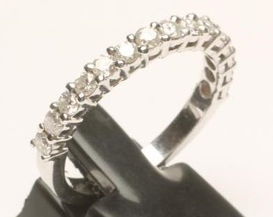 A DIAMOND HALF HOOP ETERNITY RING Image