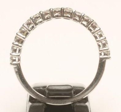 A DIAMOND HALF HOOP ETERNITY RING Image