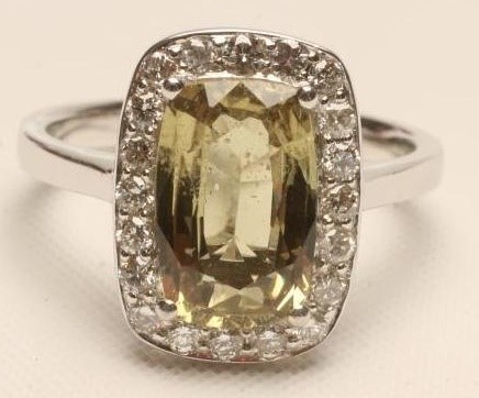 A YELLOW SAPPHIRE AND DIAMOND RING Image