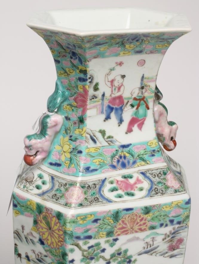 A PAIR OF CHINESE PORCELAIN VASES of inverted baluster hexagonal form with chi-long handles painted Image